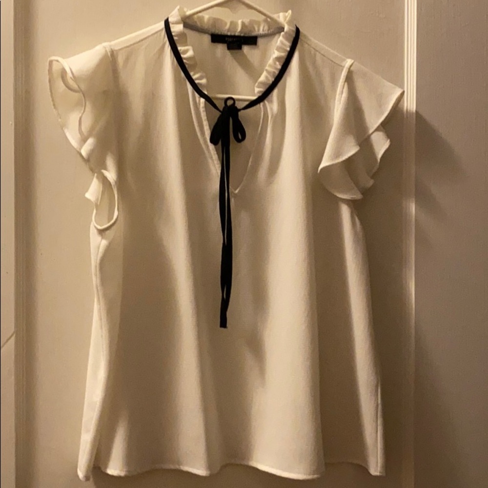 Cream blouse with black accents